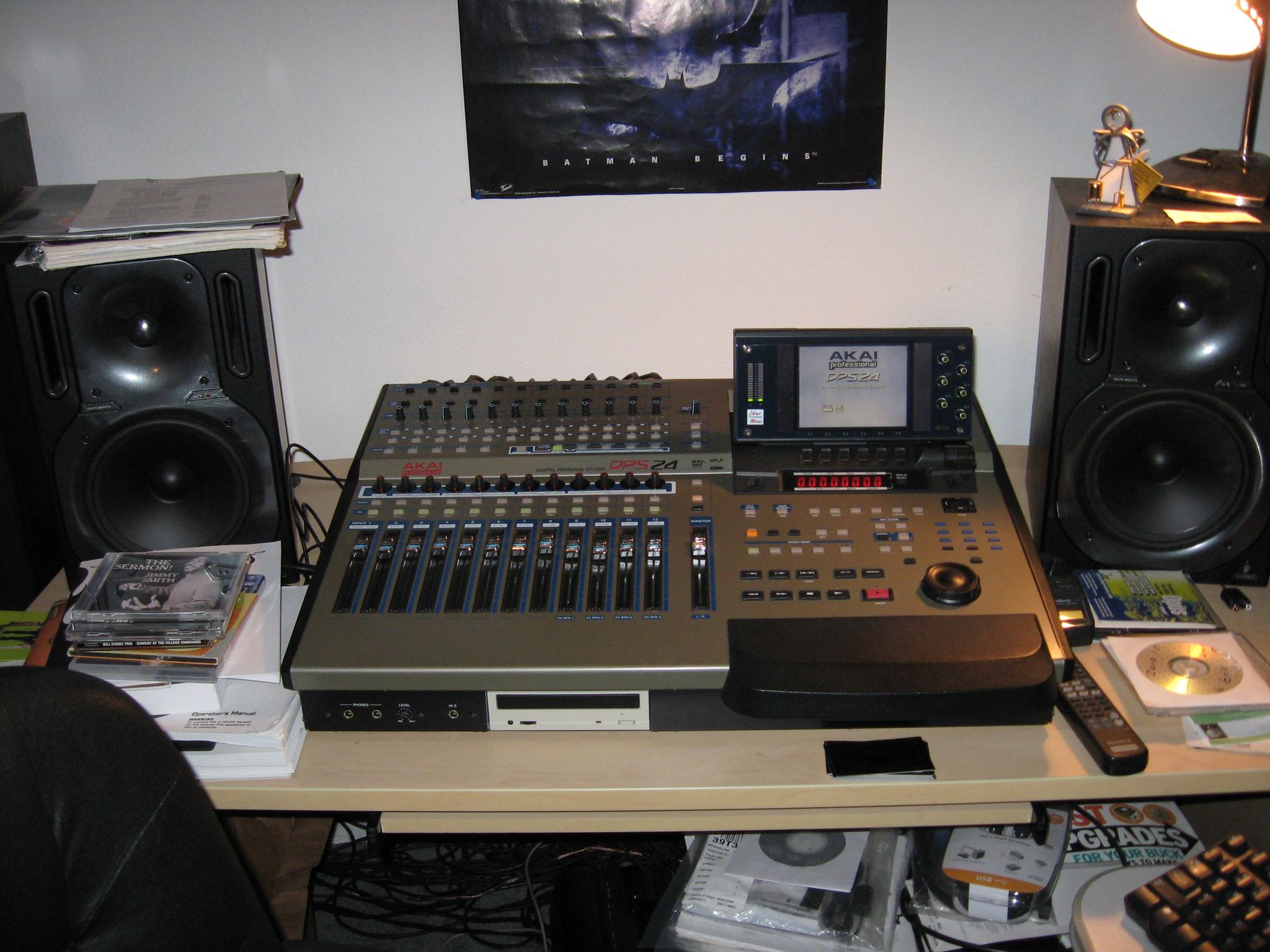 The Akai DPS24 recorder between two studio monitors