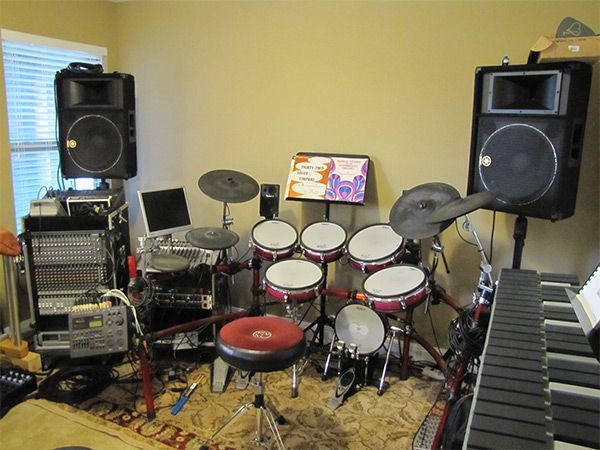 Electronic kit, keyboard and PA speakers in the practice room