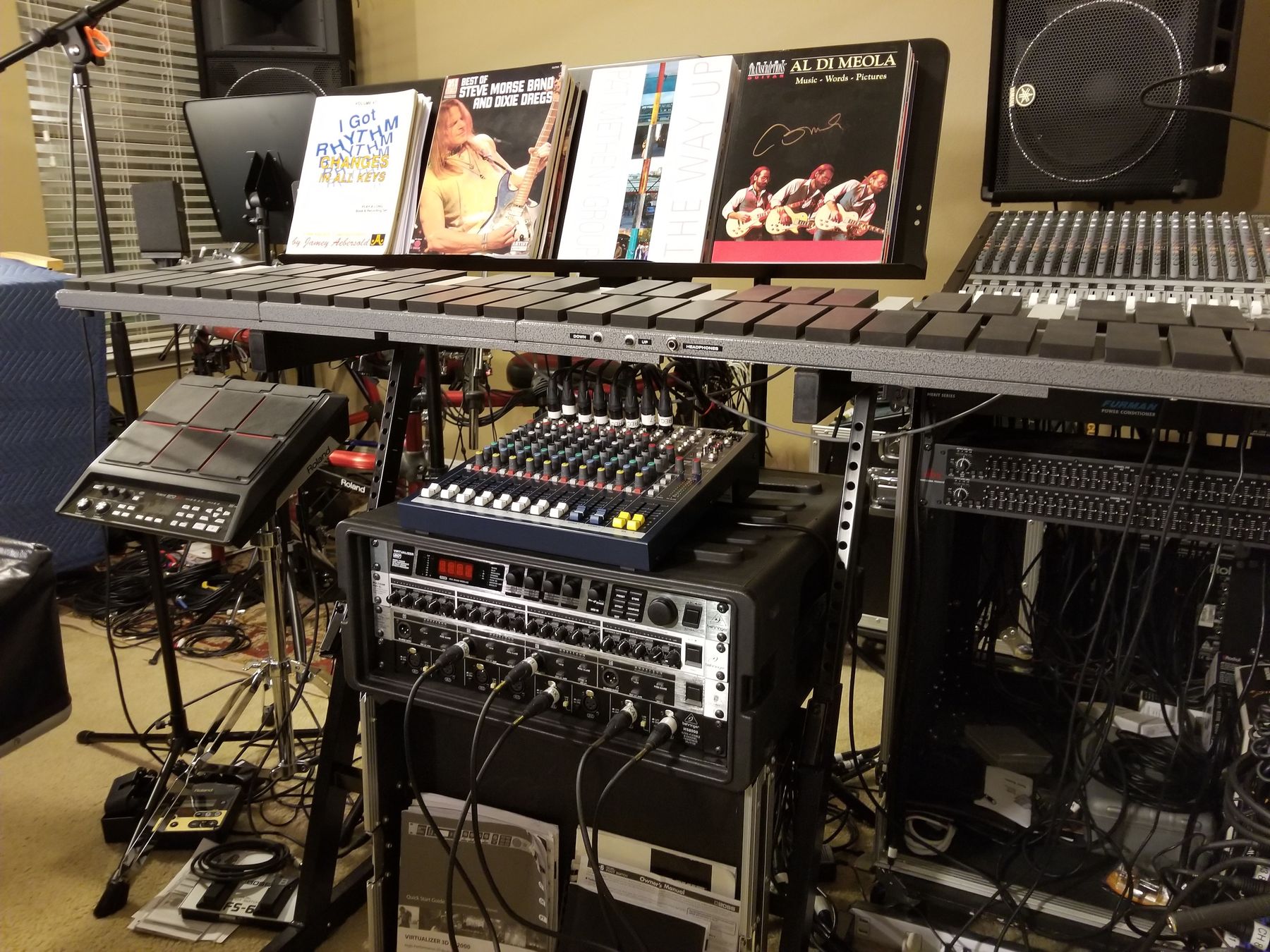 Mallet instruments, a mixer and album covers in the practice room