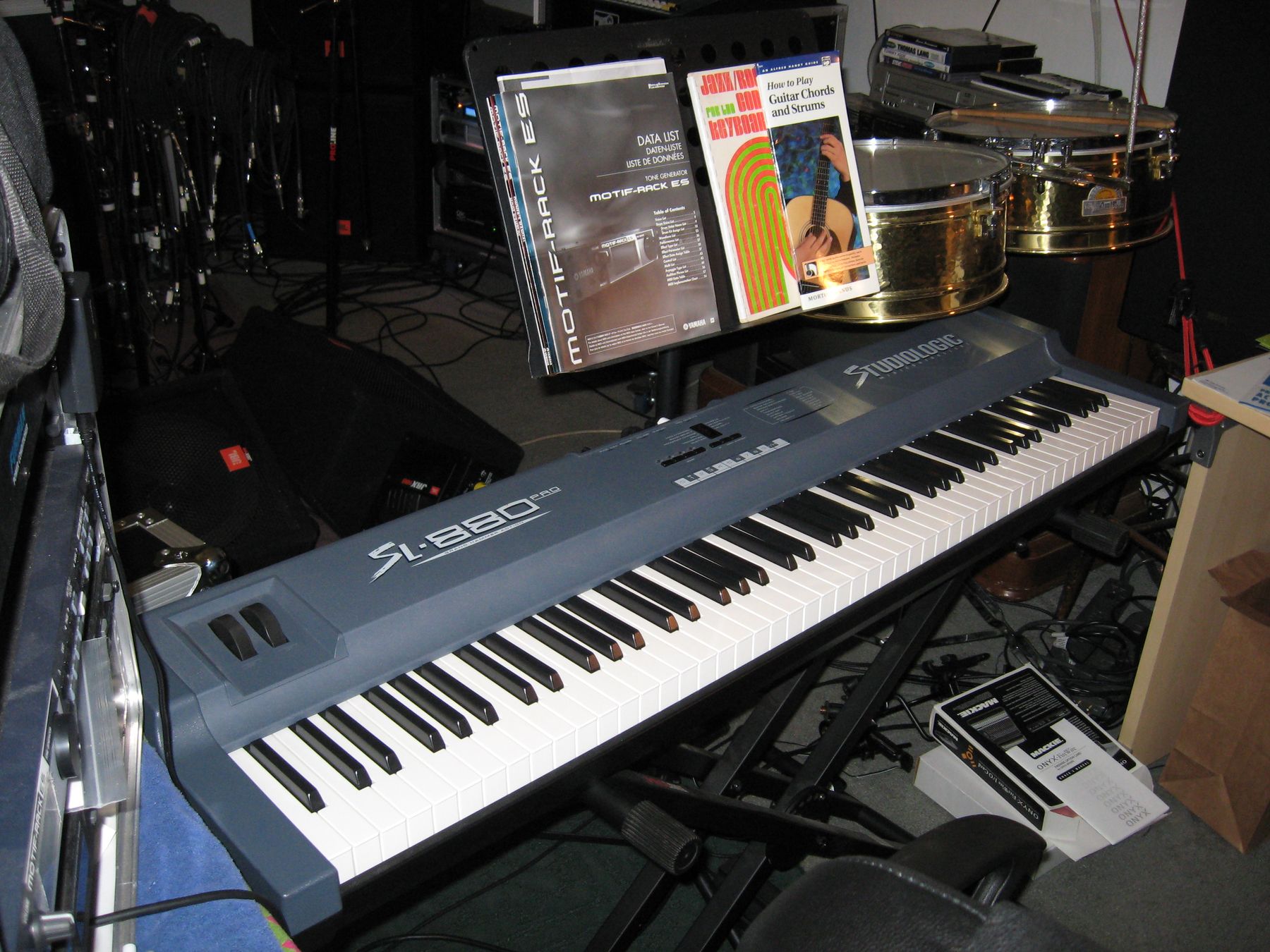 The StudioLogic SL-880 keyboard with a music stand
