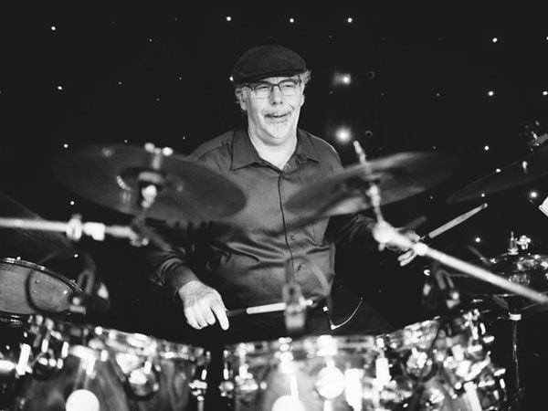 Bruce laughing at the kit, black and white