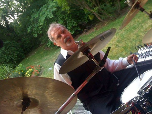 Bruce playing a garden party
